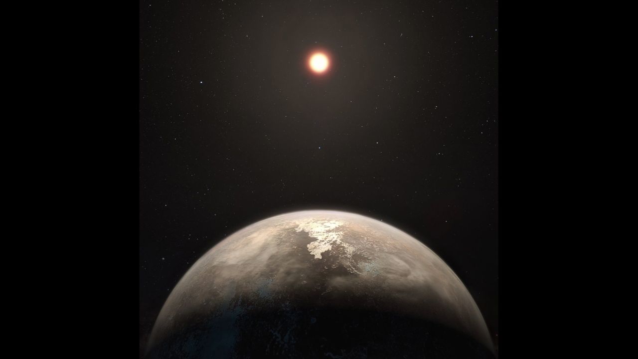 This artist's illustration shows exoplanet Ross 128 b, with its red dwarf host star in the background. The planet is only 11 light-years from our solar system. It is now the second-closest temperate planet to be detected, after Proxima b.