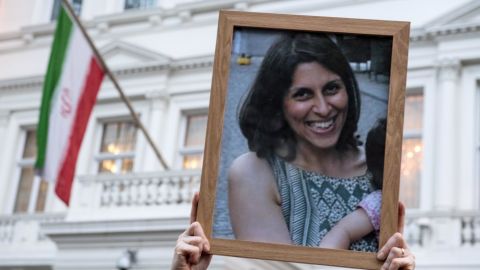 Supporters hold a photo of Nazanin Zaghari-Ratcliffe during a vigil.