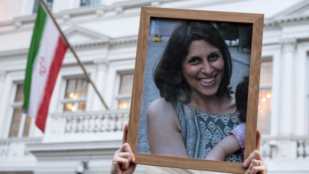 Supporters hold a photo of Nazanin Zaghari-Ratcliffe during a vigil for the British-Iranian mother in January 2017.