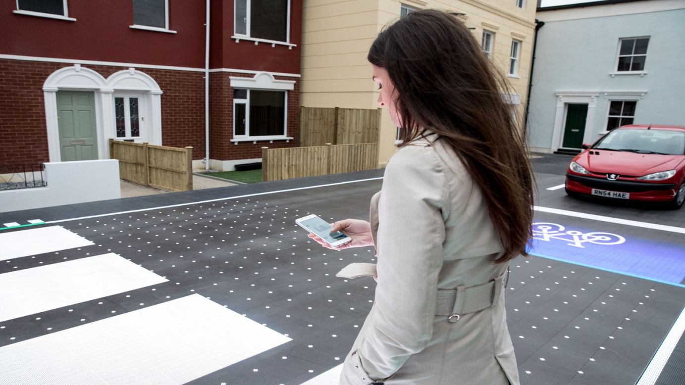 The crossing uses dynamic road and pavement patterns, which serve to grab the attention of pedestrians engrossed in their phones, urging them focus on crossing the road safely.