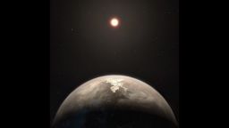 This artist's impression shows the temperate planet Ross 128 b, with its red dwarf parent star in the background. This planet, which lies only 11 light-years from Earth, was found by a team using ESO's unique planet-hunting HARPS instrument. The new world is now the second-closest temperate planet to be detected after Proxima b. It is also the closest planet to be discovered orbiting an inactive red dwarf star, which may increase the likelihood that this planet could potentially sustain life. Ross 128 b will be a prime target for ESO's Extremely Large Telescope, which will be able to search for biomarkers in the planet's atmosphere.