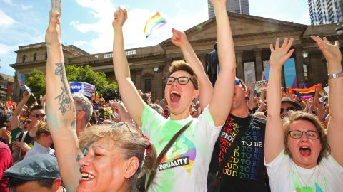 Crowds cheer as the result of the same-sex marriage survey is announced in Melbourne, November 15.