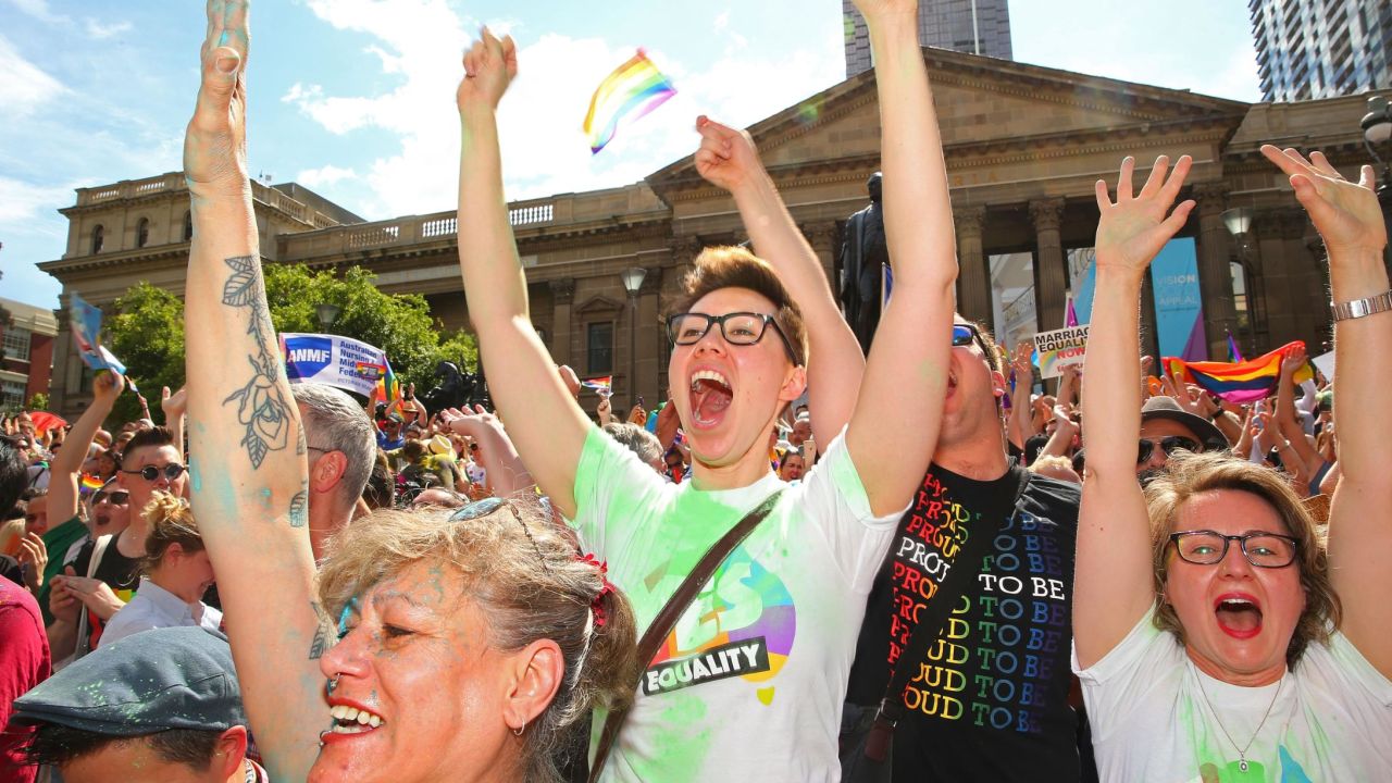 Crowds cheer as the result of the same-sex marriage survey is announced in Melbourne, November 15.