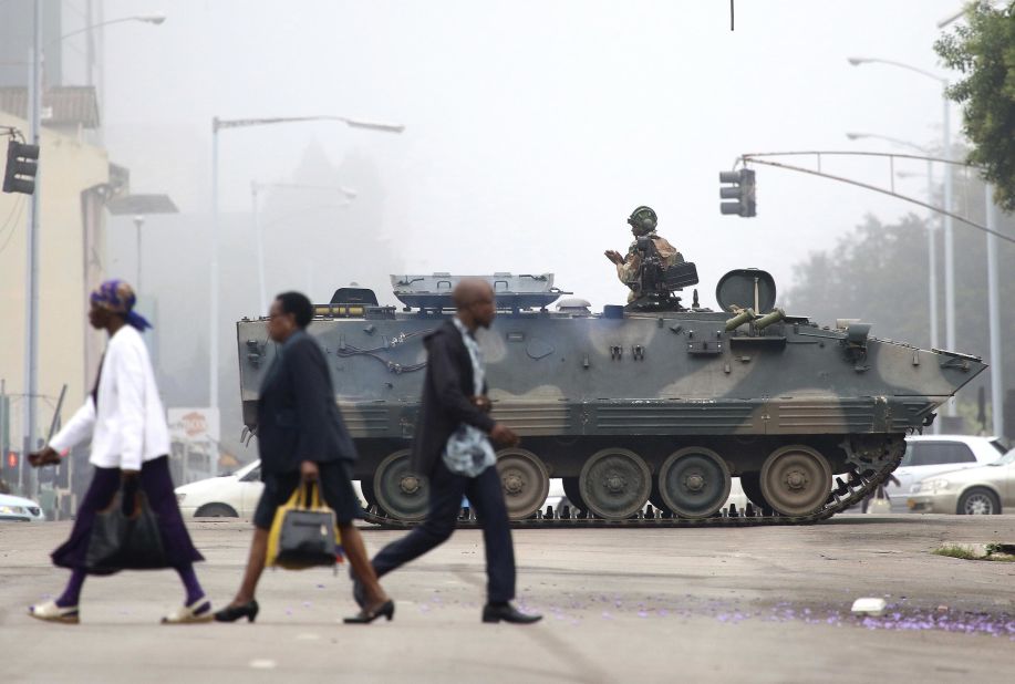 An armored vehicle patrols a street in Harare on Wednesday, November 15. In a dramatic televised statement, an <a href="http://www.cnn.com/2017/11/14/africa/zimbabwe-military-chief-treasonable-conduct/index.html">army spokesman denied that a military takeover was underway,</a> but the situation bore all the hallmarks of one. The military said Mugabe and his family were "safe."