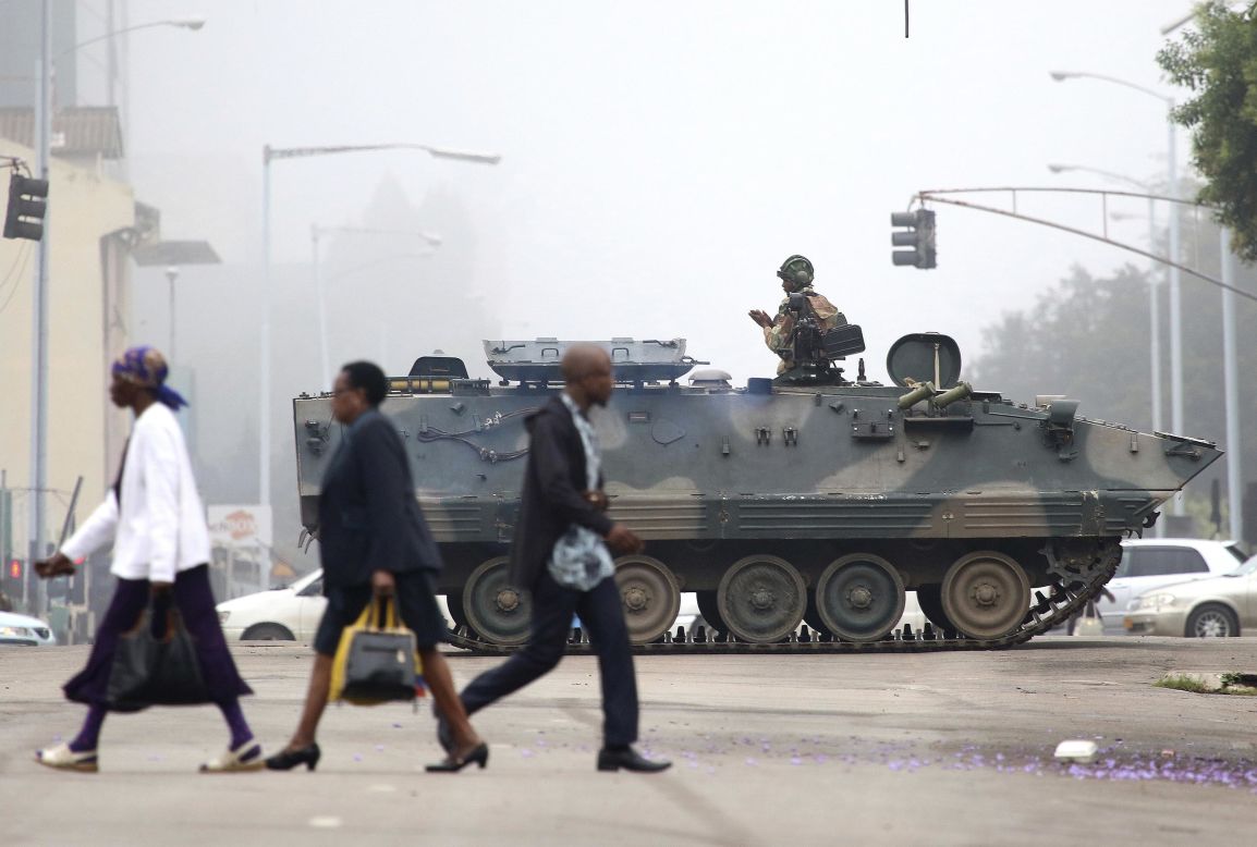 An armored vehicle patrols a street in Harare on Wednesday, November 15. In a dramatic televised statement, an <a href="http://www.cnn.com/2017/11/14/africa/zimbabwe-military-chief-treasonable-conduct/index.html">army spokesman denied that a military takeover was underway,</a> but the situation bore all the hallmarks of one. The military said Mugabe and his family were "safe."