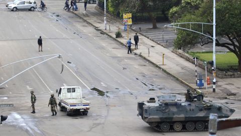 Soldiers patrol a street in Harare on November 15.