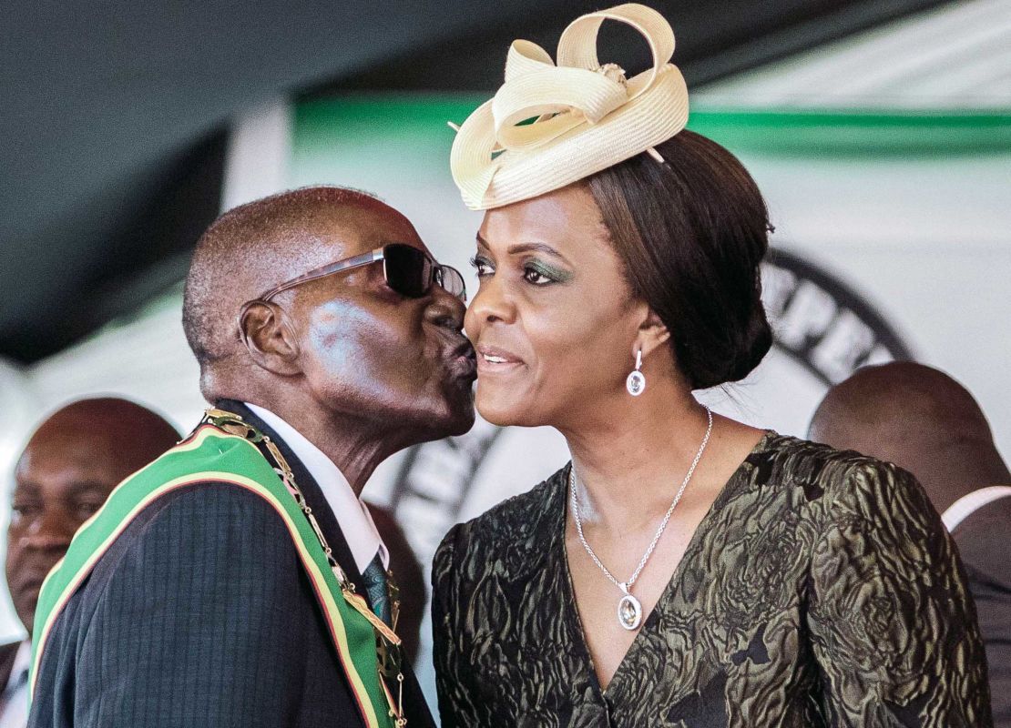 Robert Mugabe kisses his wife, Grace Mugabe, at Independence Day celebrations in Harare on April 18, 2017.