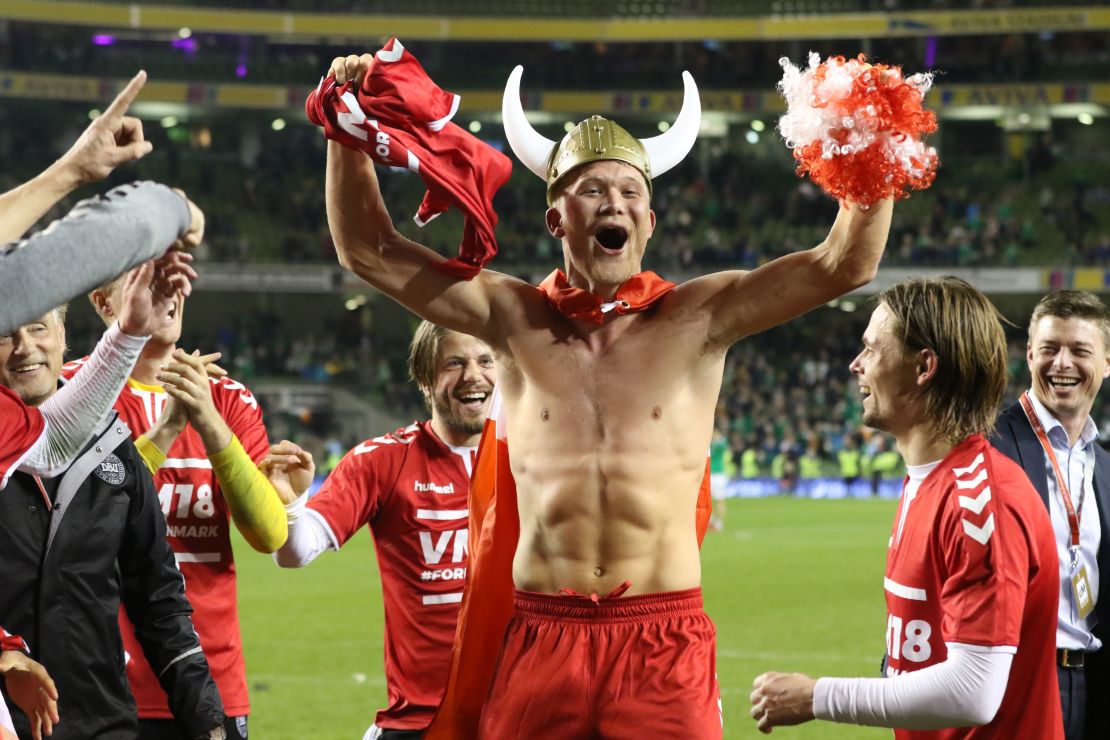 Danish striker Andreas Cornelius celebrates with teammates.