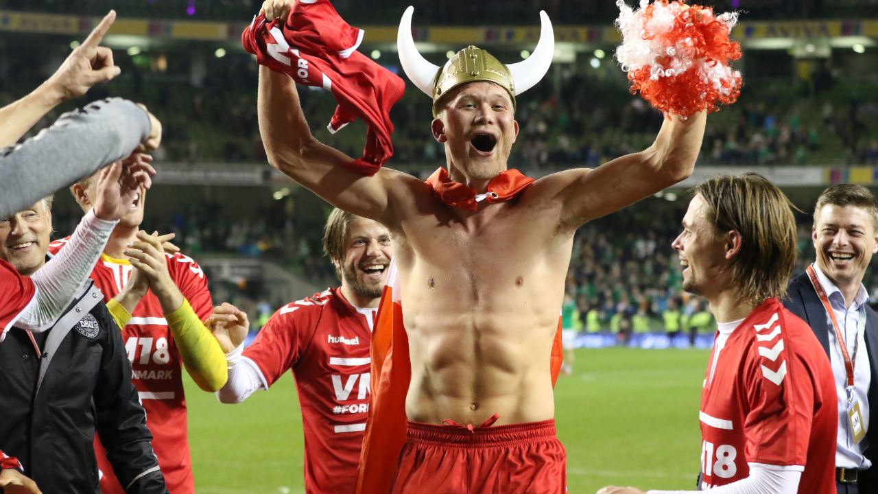 Danish striker Andreas Cornelius celebrates with teammates.