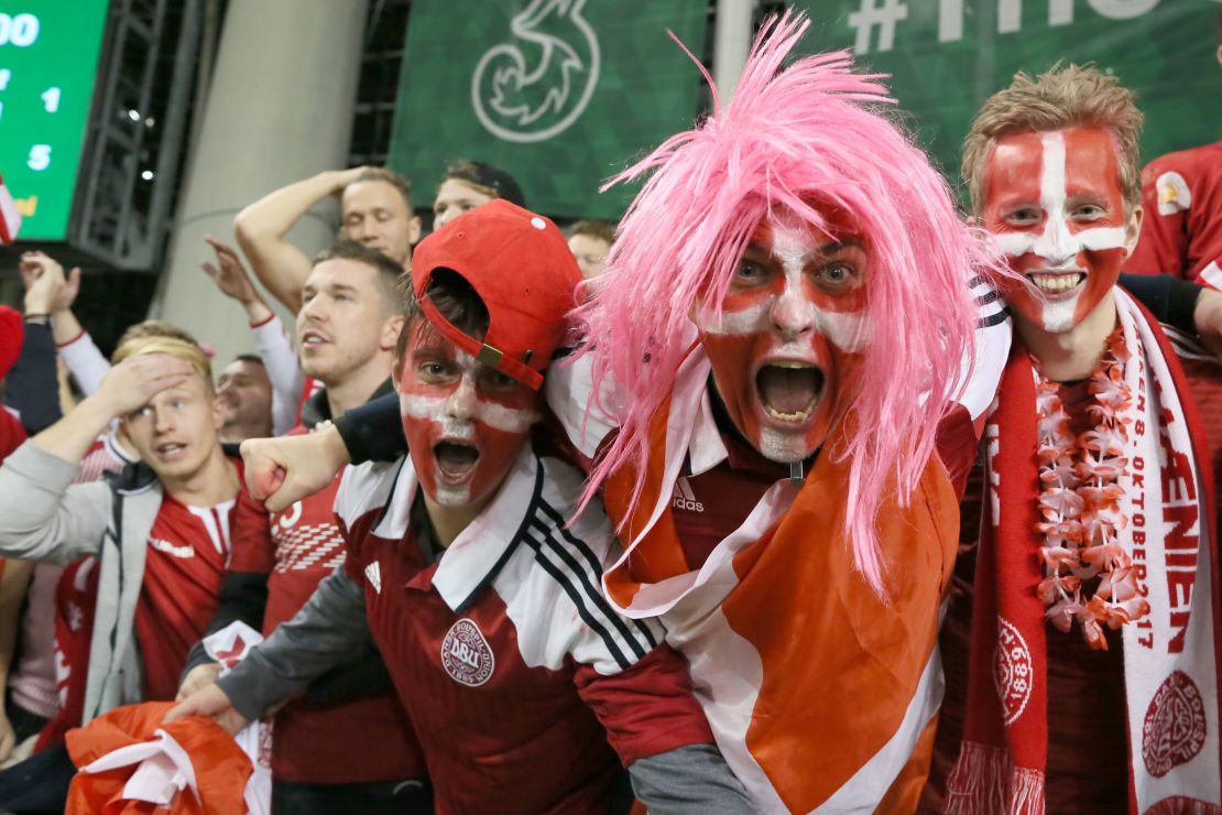 Denmark fans celebrate after their team secure a place at next year's World Cup in Russia.