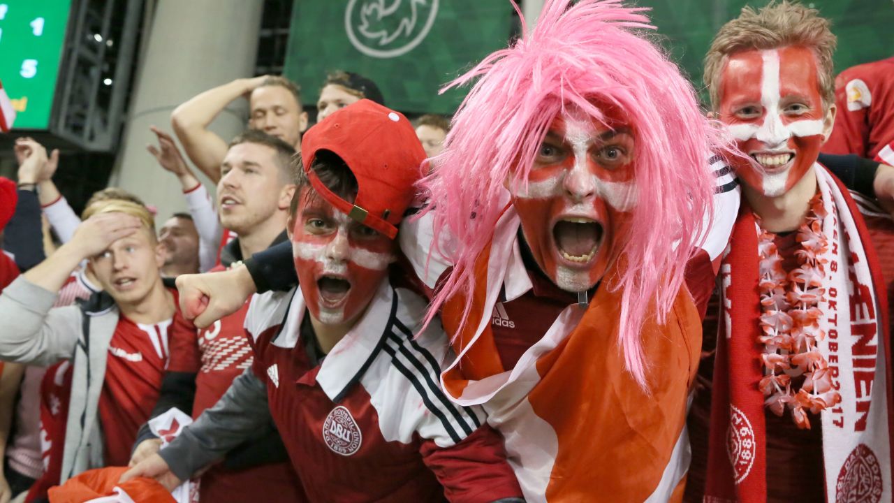 Denmark fans celebrate after their team secure a place at next year's World Cup in Russia.