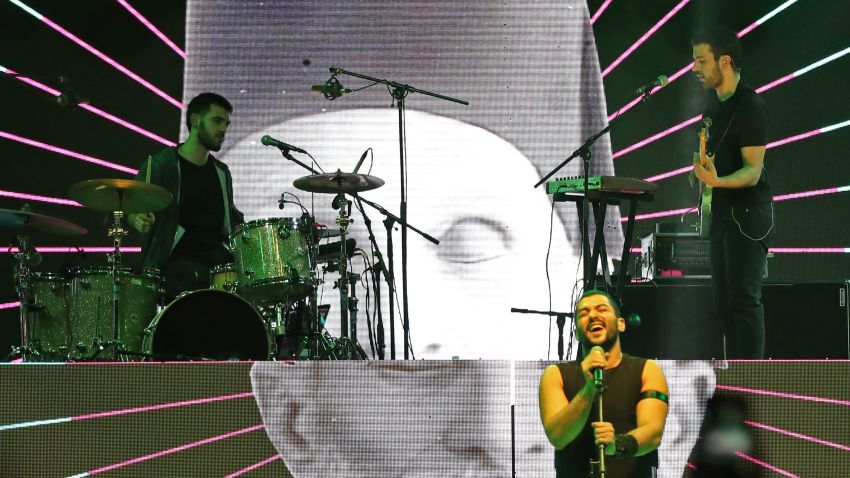 Hamed Sinno (R), the lead singer of Lebanese band Mashrou Leila, performs on stage at the Dubai International Marine Club during a music festival in the United Arab Emirates, on April, 7, 2017.
Arab artists not traditionally considered mainstream are gaining growing recognition both at home and across the globe. Bands like Lebanon's Mashrou' Leila and Jordan's Autostrad, hip-hop artists like Iraqi-Canadian Narcy and Palestinian Muqata3a, along with solo acts like Yasmine Hamdan, are at the head of the movement.
Autostrad, Narcy and Mashrou' Leila headlined the April 7 closing night of Dubai's STEP 2017 conference, an annual technology, digital and entertainment festival. / AFP PHOTO / KARIM SAHIB        (Photo credit should read KARIM SAHIB/AFP/Getty Images)