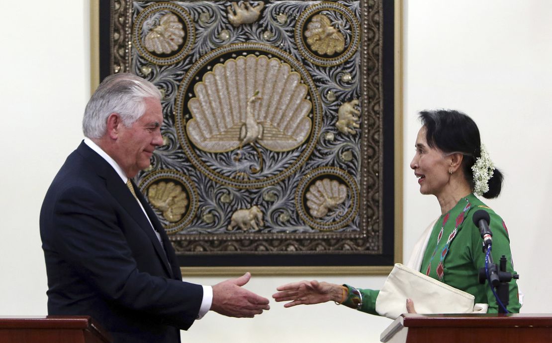 Myanmar's leader Aung San Suu Kyi, right, shakes hands with visiting US Secretary of State Rex Tillerson in Naypyitaw, Myanmar.