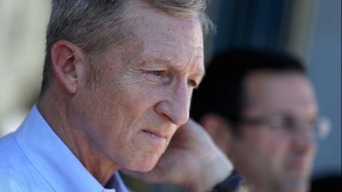 SAN FRANCISCO, CA - OCTOBER 24:  Billionaire Tom Steyer (L) looks on during a rally and press conference at San Francisco City Hall on October 24, 2017 in San Francisco, California. (Photo by Justin Sullivan/Getty Images)