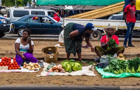 Business continues as usual in Harare as roadside vendors sell vegetables on November 16.