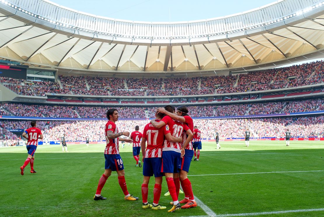 Atletico Madrid celebrates after scoring the opener in the 2-0 win over Sevilla, one of only two home victories this season.