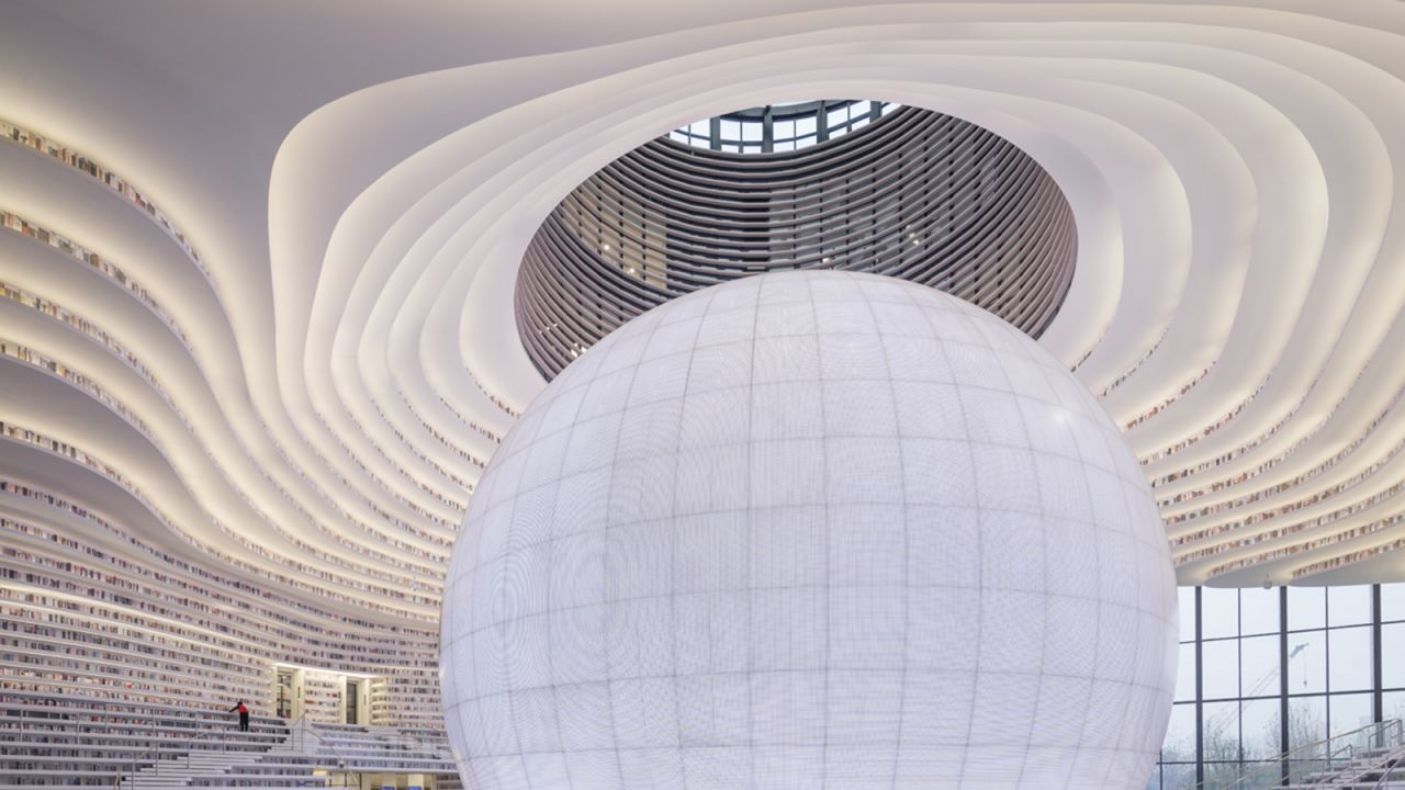 <strong>The sphere: </strong>The new structure has a sleek futuristic design featuring a luminous spherical auditorium space in the center, created by the Dutch architecture firm MVRDV and Tianjin's Urban Planning Design Institute. 