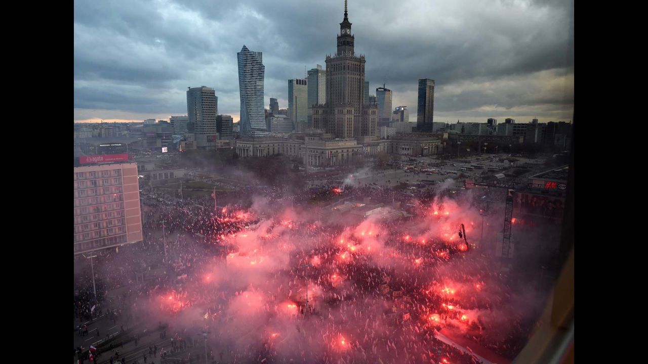 Nationalist protesters burn flares <a href="http://www.cnn.com/2017/11/12/europe/poland-warsaw-nationalist-march/index.html" target="_blank">as they disrupt Independence Day celebrations</a> in Warsaw, Poland, on Saturday, November 11. Demonstrators wore masks and waved Polish flags, chanting "Death to enemies of the homeland" and "Catholic Poland, not secular."