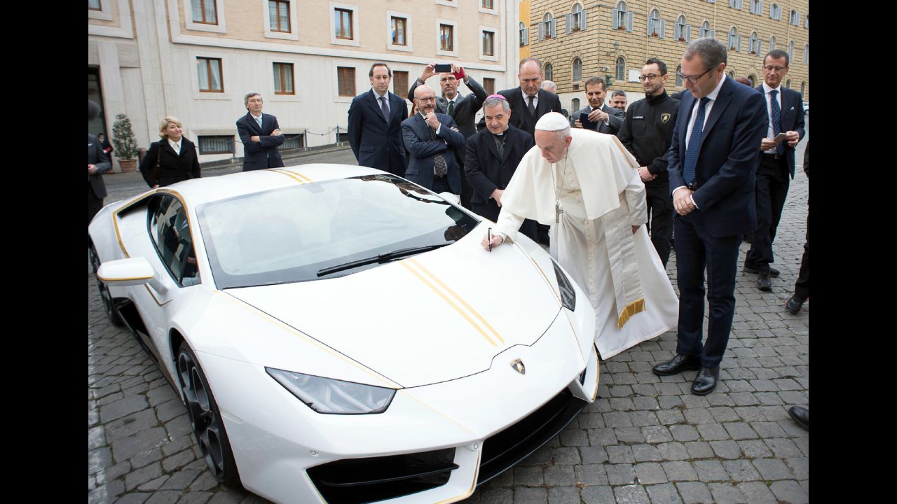 Pope Francis writes on the hood of a Lamborghini that the automaker gave to him as a gift on Wednesday, November 15. The Vatican <a href="http://www.cnn.com/2017/11/15/europe/pope-new-car-for-charity-trnd/index.html" target="_blank">plans to auction off the car,</a> with proceeds going to three charities.