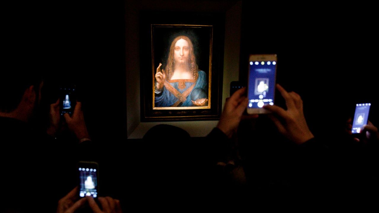 People use their phones to take pictures of the Leonardo da Vinci painting "Salvator Mundi" before it was auctioned in New York on Wednesday, November 15. The rare painting has become <a href="http://www.cnn.com/style/article/da-vinci-salvator-mundi-sale-christies/index.html" target="_blank">the most expensive artwork to ever sell at auction,</a> going for $450.3 million.
