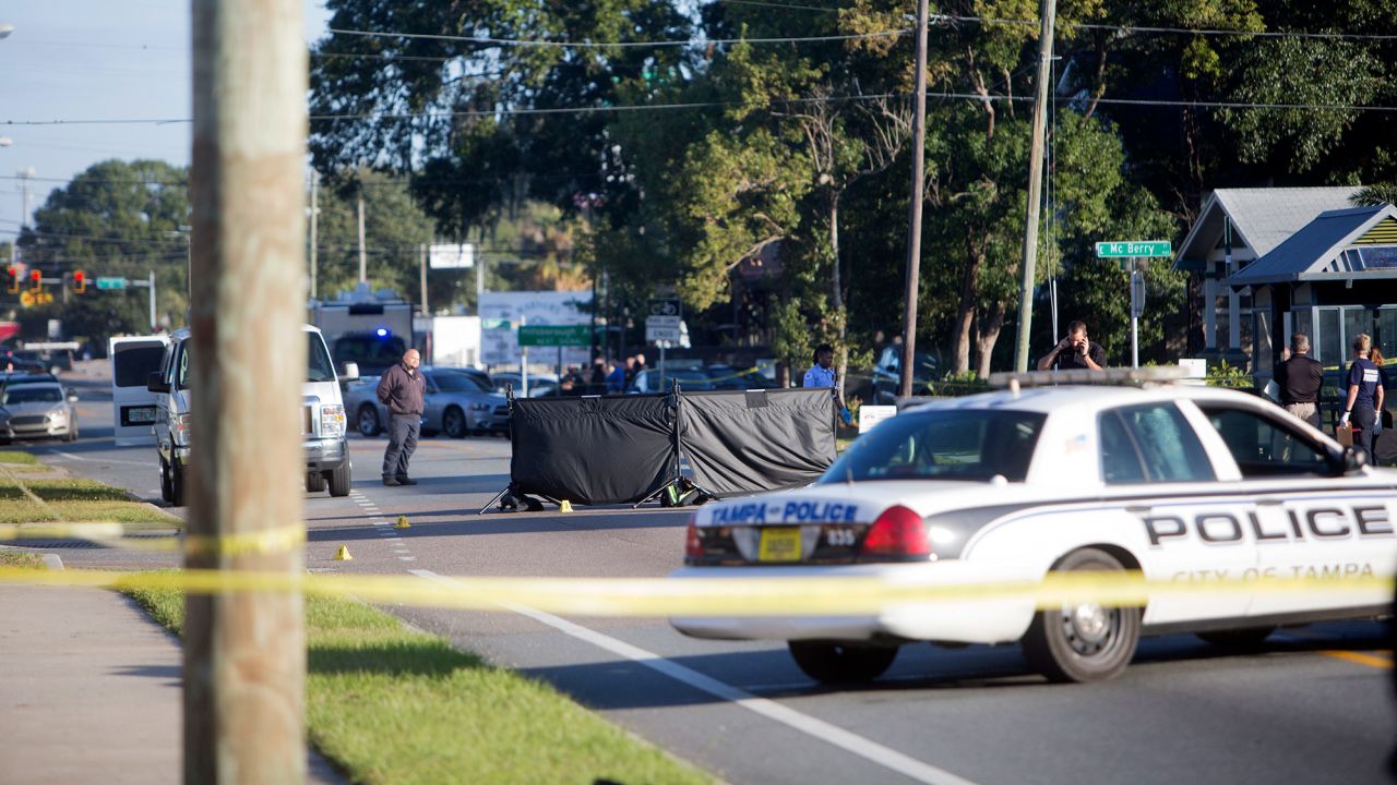 Law enforcement officials investigate a fatal shooting in Tampa, Florida, on Tuesday, November 14. A 60-year-old man was shot and killed in the Seminole Heights area, the fourth such death in <a href="http://www.cnn.com/2017/11/14/us/tampa-seminole-heights-unsolved-killings/index.html" target="_blank">what police say is a string of unsolved killings in that neighborhood</a> within the past month.