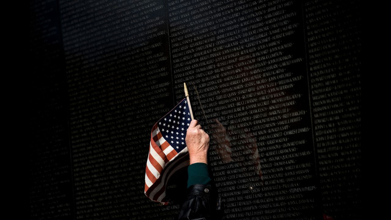 A man points to a name while visiting the Vietnam War Memorial in Washington on Friday, November 10. Veterans Day fell on a Saturday this year. <a href="http://www.cnn.com/2017/11/09/world/gallery/week-in-photos-1110/index.html" target="_blank">See last week in 27 photos</a>