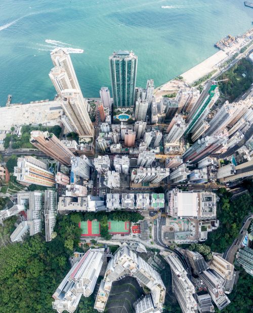 <strong>Derry Ainsworth: </strong>In "City By the Sea," Ainsworth captures the stark juxtaposition between dense towers and the peaceful harbor. The aerial image was taken in Kennedy Town (on the western side of Hong Kong island).