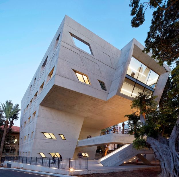 After launching a design competition, The American University of Beirut chose Zaha Hadid's proposal for its new Issam Fares Institute building. Completed in 2014, the facility features a 100-seat auditorium and a group of smaller rooms that appear to "float" above the main exterior courtyard.