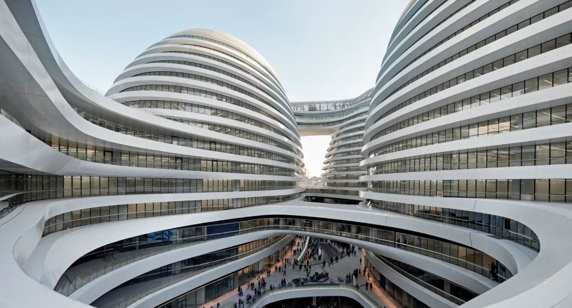 A modern Beijing landmark, Galaxy SOHO offers another example of Hadid's signature curves. They flow down from the building's four towers to a subterranean courtyard that was inspired by traditional Chinese architecture.