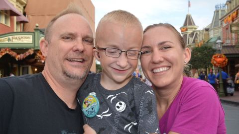 Shane Vysocky, 7, with his parents, Shaun and Courtney.