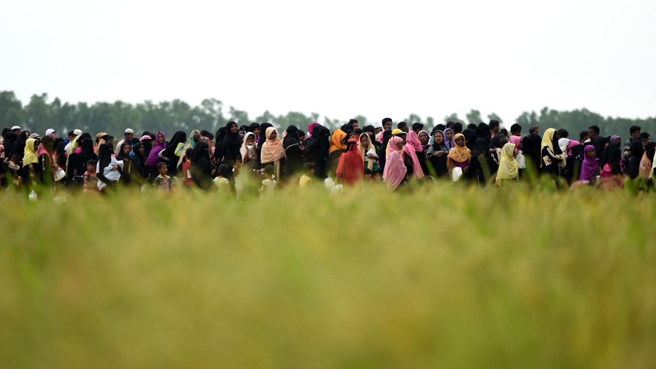 Rohingya Muslim refugees wait for relief aid at Nayapara refugee camp in Teknaf on October 21, 2017.
Thousands of Rohingya Muslims stranded near Bangladesh's border this week after fleeing violence in Myanmar have finally been permitted to enter refugee camps after "strict screening", officials said on Ocotber 19. / AFP PHOTO / Tauseef MUSTAFA        (Photo credit should read TAUSEEF MUSTAFA/AFP/Getty Images)