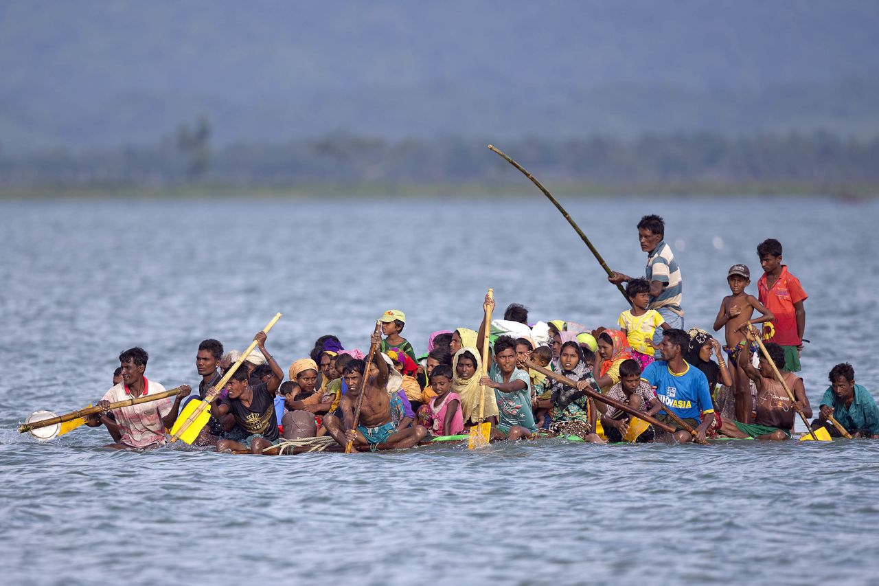 Rohingya Muslims paddle a makeshift raft as they cross the Naf River from Myanmar into Bangladesh on November 12. Human rights activists consider the Rohingya to be among the world's most persecuted people.