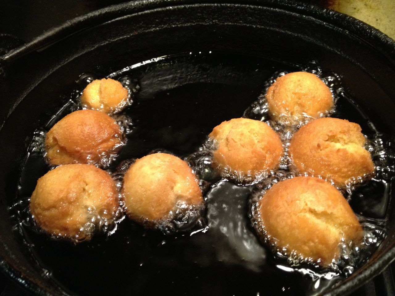<strong>Sweet buns: </strong>Sata andagi (the name means literally "deep-fried sugar") are Okinawan donuts, a heavyweight confection with a crisp, deep brown crust encasing a dense, cakey center.
