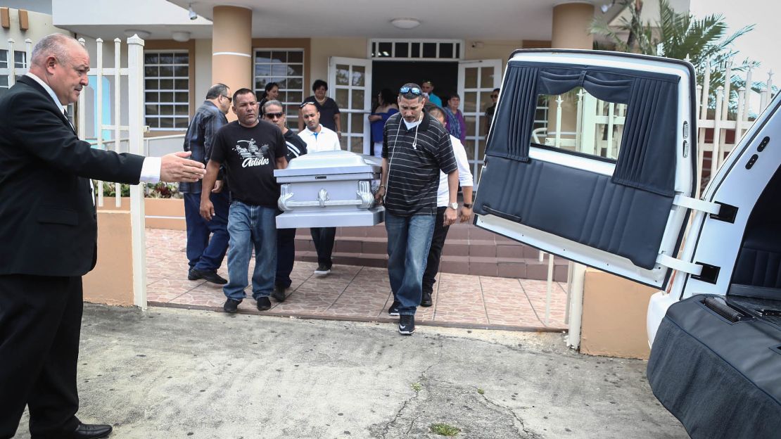Mourners carry Sonia Irizarry's casket in October in Hormigueros. The hurricane delayed her funeral.