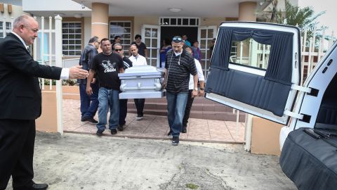 Mourners carry Sonia Irizarry's casket in October in Hormigueros. The hurricane delayed her funeral.
