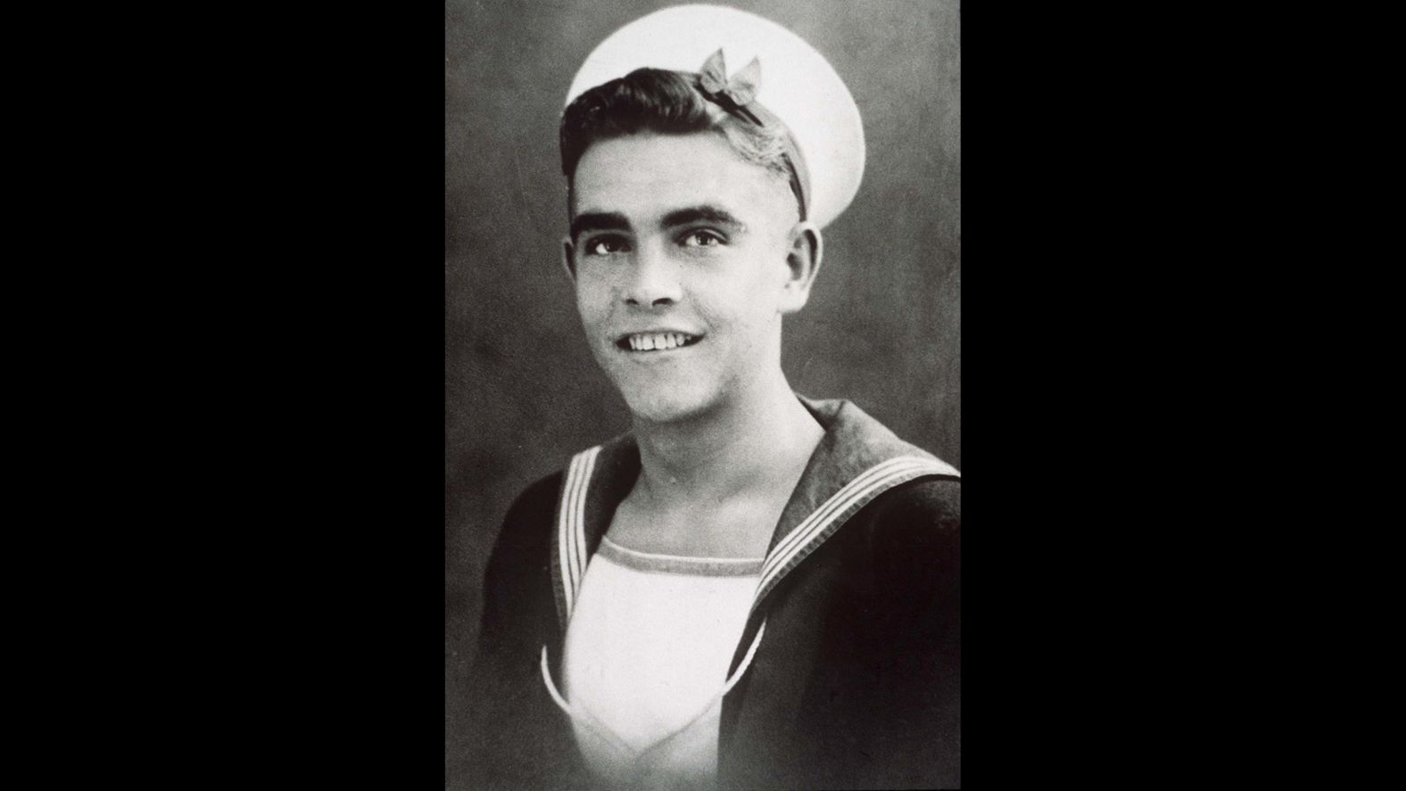 A young Connery poses for a photo. He quit school in his early teens and enlisted in the military.