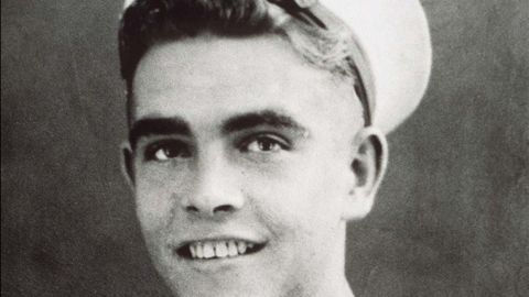 A young Connery poses for a photo. He quit school in his early teens and enlisted in the military.