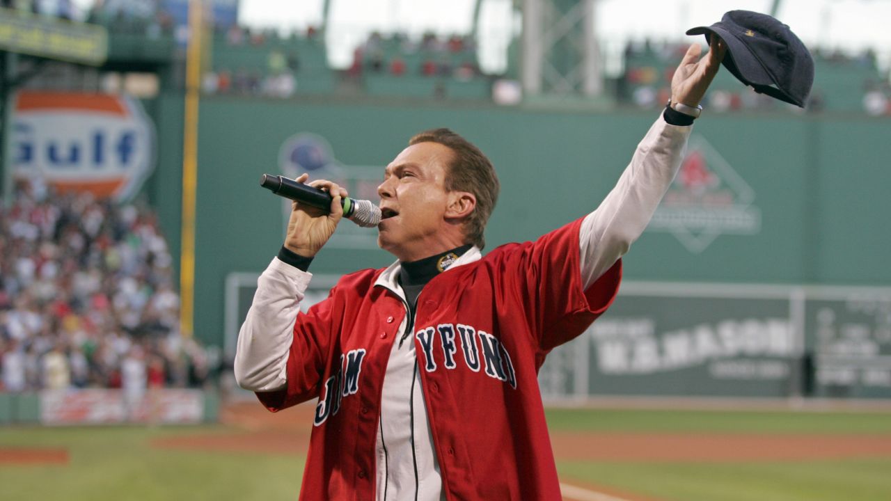 Cassidy sings the National Anthem before the start of a 2009 baseball game between the Boston Red Sox and Chicago White Sox at Fenway Park in Boston.  