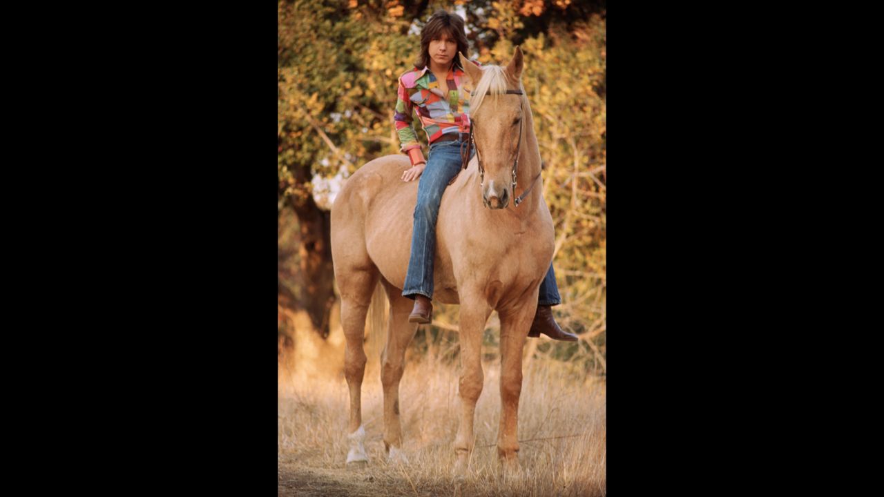 Posters of Cassidy graced the walls of young girls everywhere in the early '70s. Here he poses on a horse.