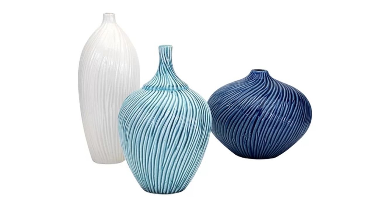 <strong>R: Rosecliff Heights Whitmore 3 Piece Vase Set ($116.99; </strong><a href="https://www.wayfair.com/decor-pillows/pdp/rosecliff-heights-whitmore-3-piece-vase-set-rohe5254.html" target="_blank" target="_blank"><strong>wayfair.com</strong></a><strong>) </strong>