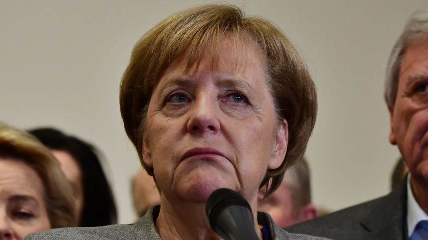 German Chancellor and leader of the Christian Democratic Union (CDU) party, Angela Merkel, looks on while speaking after exploratory talks on forming a new government broke down on November 19, 2017 in Berlin.
Tough talks to form Germany's next government stretched into overtime, putting Chancellor Angela Merkel's political future in the balance since failure to produce a deal could force snap elections. / AFP PHOTO / Tobias SCHWARZ        (Photo credit should read TOBIAS SCHWARZ/AFP/Getty Images)