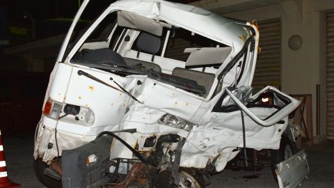 A wrecked light truck at a police station in Okinawa is seen on Sunday after it collided with a truck that authorities allege was driven by a US service member. 