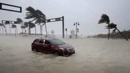 FORT LAUDERDALE, FL - SEPTEMBER 10:  A car sits abandoned in storm surge along North Fort Lauderdale Beach Boulevard as Hurricane Irma hits the southern part of the state September 10, 2017 in Fort Lauderdale, Florida. The powerful hurricane made landfall in the United States in the Florida Keys at 9:10 a.m. after raking across the north coast of Cuba.  (Photo by Chip Somodevilla/Getty Images)