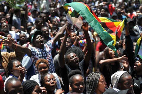 Students from the University of Zimbabwe participate in a demonstration in Harare on November 20.