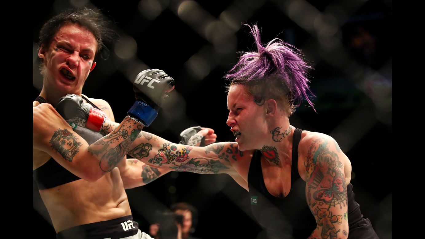 Bec Rawlings punches Jessica-Rose Clark during their UFC bout in Sydney on Sunday, November 19. Clark won by split decision.