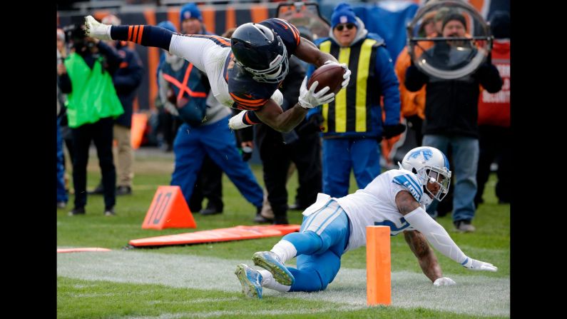 Chicago running back Tarik Cohen leaps over Detroit safety Glover Quin to score a touchdown on Sunday, November 19. It tied the game at 24 late in the fourth quarter, but Detroit prevailed after a 52-yard field goal by Matt Prater.