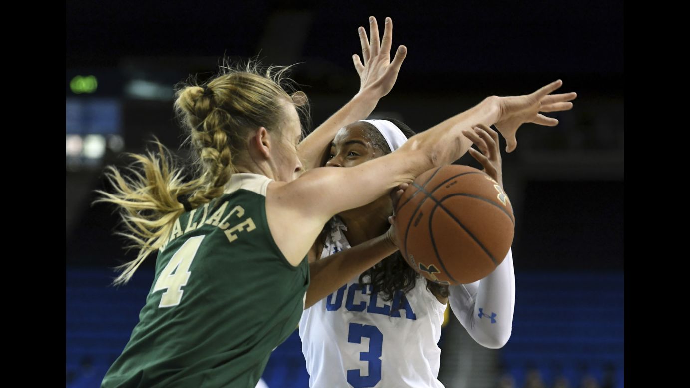 Baylor's Kristy Wallace fouls UCLA's Jordin Canada during a college basketball game in Los Angeles on Saturday, November 18.