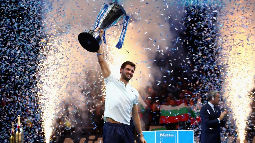 LONDON, ENGLAND - NOVEMBER 19:  Grigor Dimitrov of Bulgaria lifts the trophy as he celebrates victory following the singles final against David Goffin of Belgium during day eight of the 2017 Nitto ATP World Tour Finals at O2 Arena on November 19, 2017 in London, England.  (Photo by Clive Brunskill/Getty Images)
