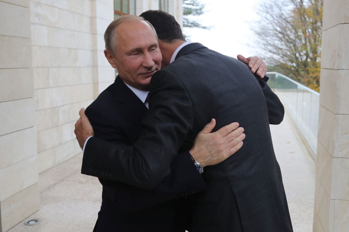 Russia's President Vladimir Putin embraces his Syrian counterpart Bashar al-Assad during a meeting in Sochi.
