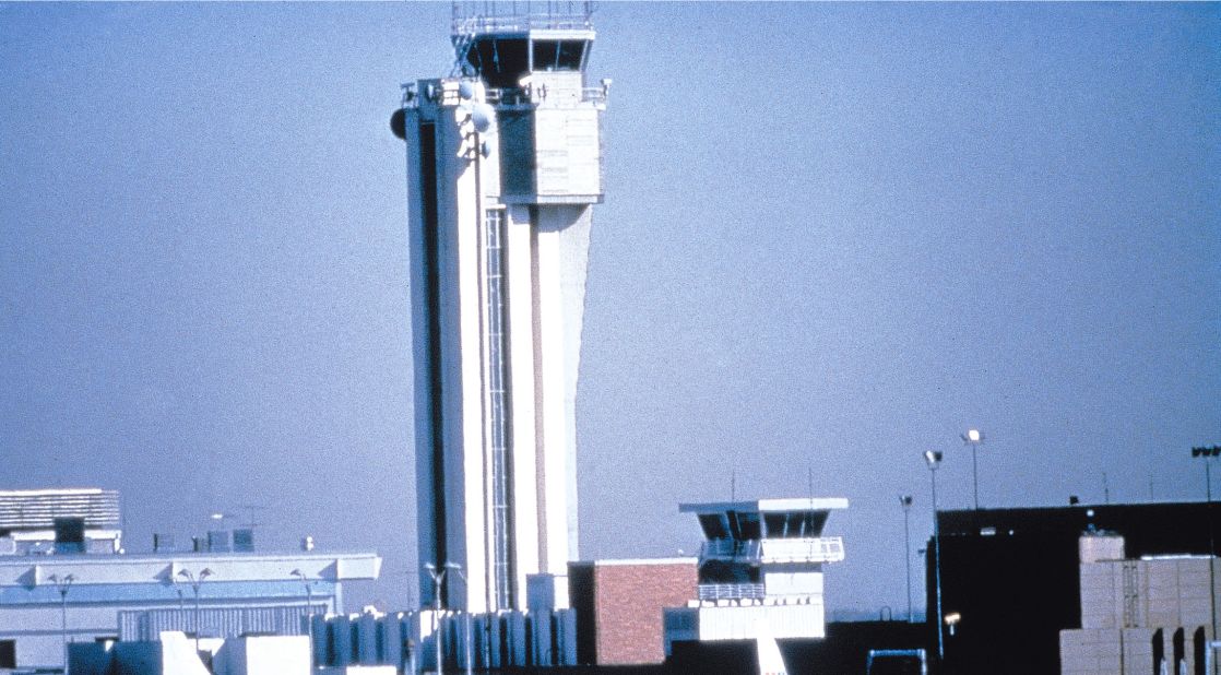 <strong>Flashback to the future:</strong> Other hark backs include "custom wall coverings representing the view from 30,000 feet, as well as a hostess stand made from vintage steamer trunks, and a staircase railing with airplane cutouts," adds Stone. Pictured here: the airport tower when the airport was operational.